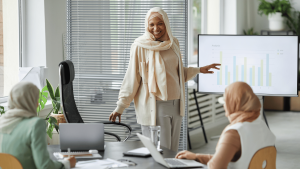 woman-with-hijab-presenting-to-board-members
